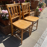 Pair of vintage chapel chairs right side view