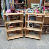A pair of vintage pine wall shelves