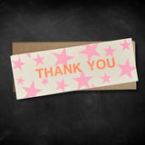 Card with 'Thank You' text and pink stars on a dark background