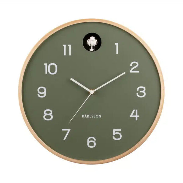 Green wall clock with wooden frame on a white background