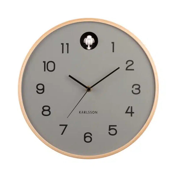 Wall clock with gray face and wooden frame on a white background
