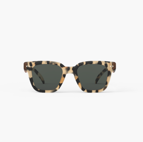 Black and beige tone mix sun glasses on a white background 