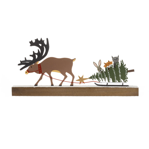 Decorative figure of a reindeer pulling a sleigh with cats and a star on a white background