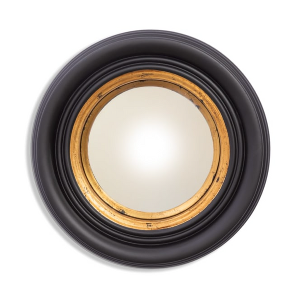 Round mirror with black frame and gold inner rim on a white background