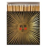 Safety matches with a decorative box featuring a sun design on a white background