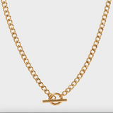 Gold chain necklace with a clasp on a white background