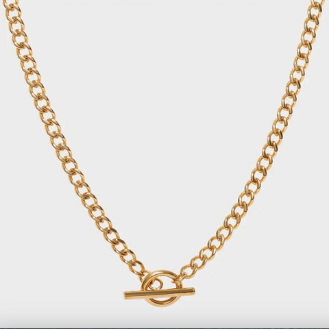 Gold chain necklace with a clasp on a white background