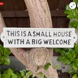 This Is A Small House With A Big Welcome Metal Sign