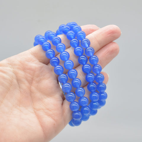 files/Semi_Precious_Gemstone_Round_Beaded_Bracelet_-_Blue_Agate_on_hand.jpg