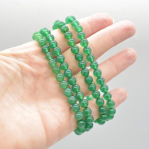 files/Semi_Precious_Gemstone_Round_Beaded_Bracelet_-_Green_Agate_on_hand.jpg