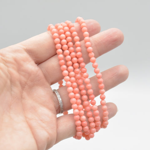 files/Semi_Precious_Gemstone_Round_Beaded_Bracelet_-_Pink_Coral_Dyed_on_hand.jpg