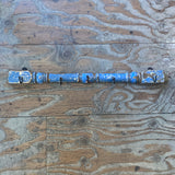 Set of 5 Vintage Hooks on a Blue Painted Balustrade