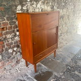 Side View of a Mid Century Teak Bureau 