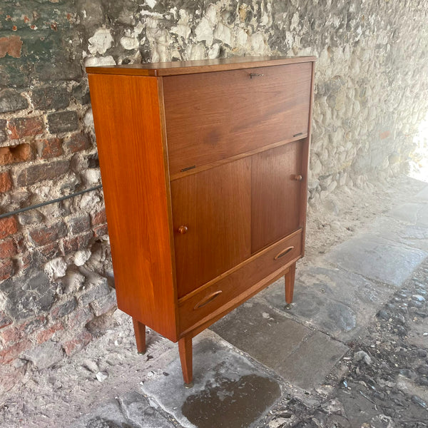 Side View of a Mid Century Teak Bureau 