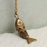 Silk Purse, Sow's Ear Gold Moving Fish Necklace upright