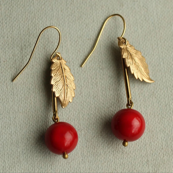 Silk Purse, Sow's Ear Single Leaf Red Cherry Earrings. close up