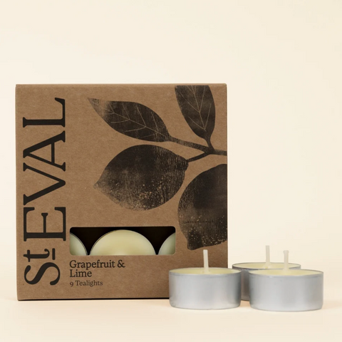 St Eval grapefruit & lime tealights with packaging on a beige background