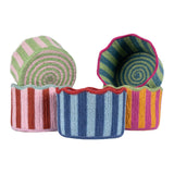 Set of colorful striped fabric containers on a white background