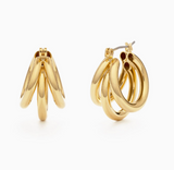 Gold hoop earrings on a white background