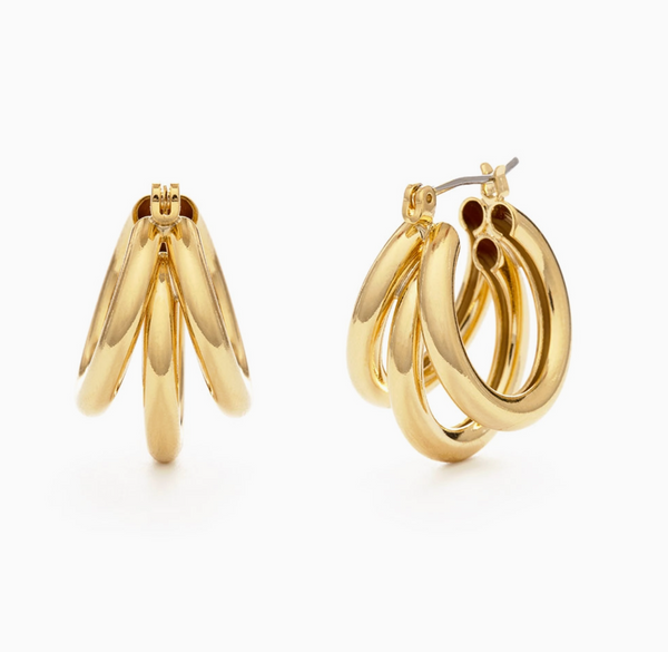 Gold hoop earrings on a white background