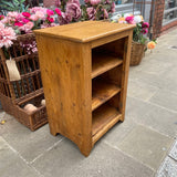Vintage pine bookcase side view