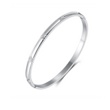 White Leaf Engraved Star Detail Bangle in Silver