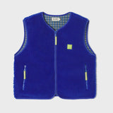 Blue fleece vest with yellow accents on a light gray background