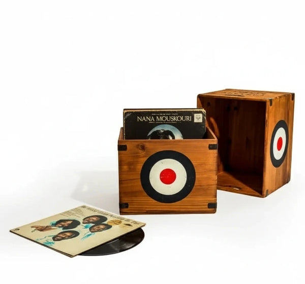 Wooden record player with vinyl records and a cover on a white background