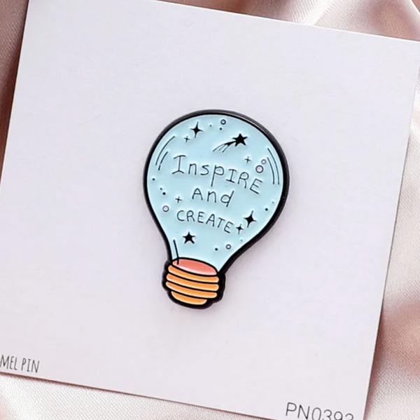 attic creations 'inspire and create' enamel pin