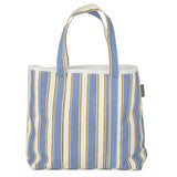 Striped tote bag with blue and white stripes on a white background