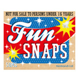 A vintage-style product box for 'Fun Snaps' featuring a bold red, white, and blue design with starburst graphics and text reading 'NOT FOR SALE TO PERSONS UNDER 16 YEARS' and '50PCS'.