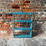 original vintage painted blue wall shelf from India. 