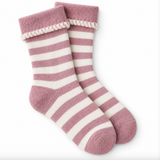 A pair of fuzzy striped socks in dusty pink and cream, featuring a textured cream cuff with a ruffled edge, shown against a plain white background.