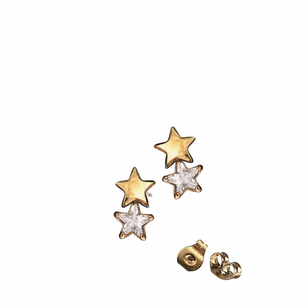 Star-shaped earrings with gold and silver finishes on a white background